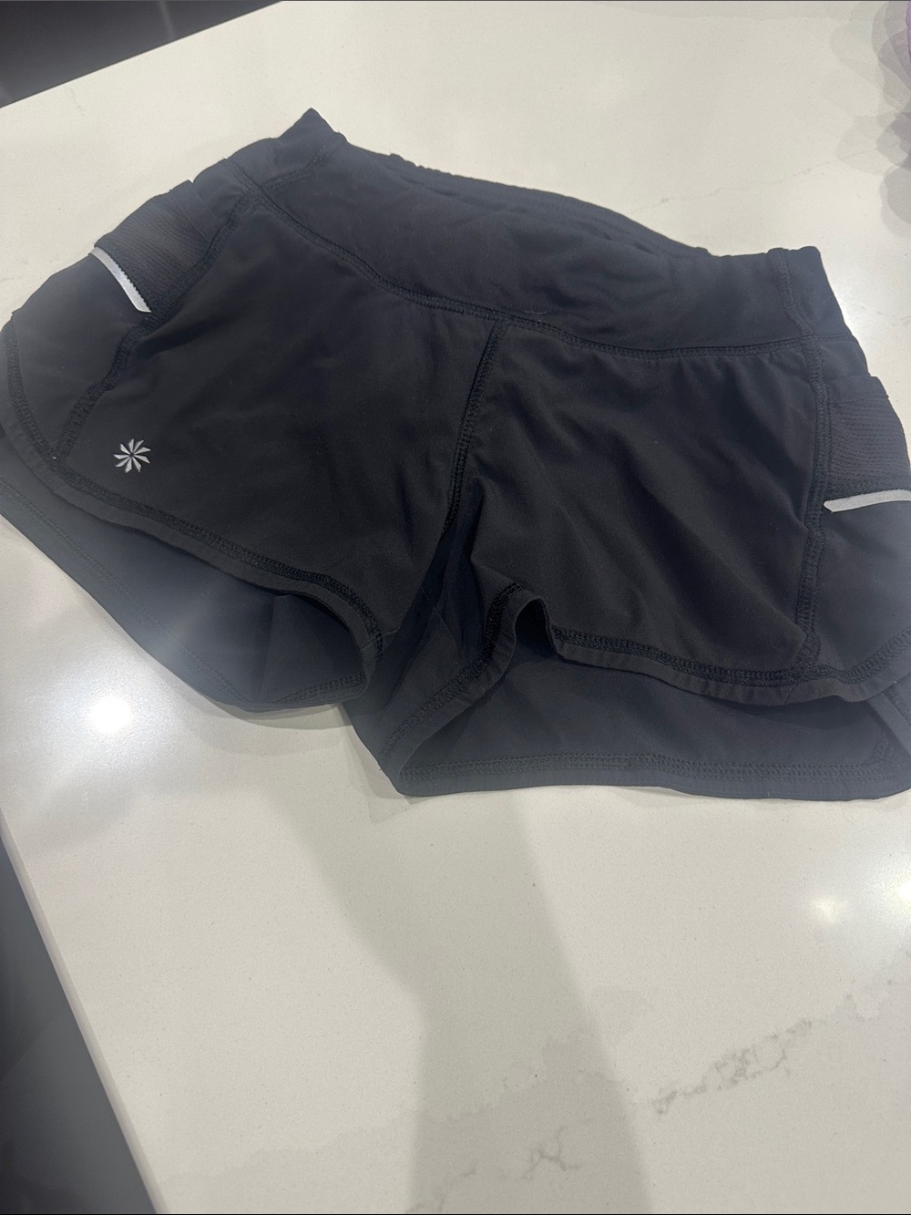 Athleta Girl black athletic lined shorts with reflective accents size XS 6